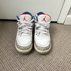 Nike White and Blue Sneakers with Minimalist Design